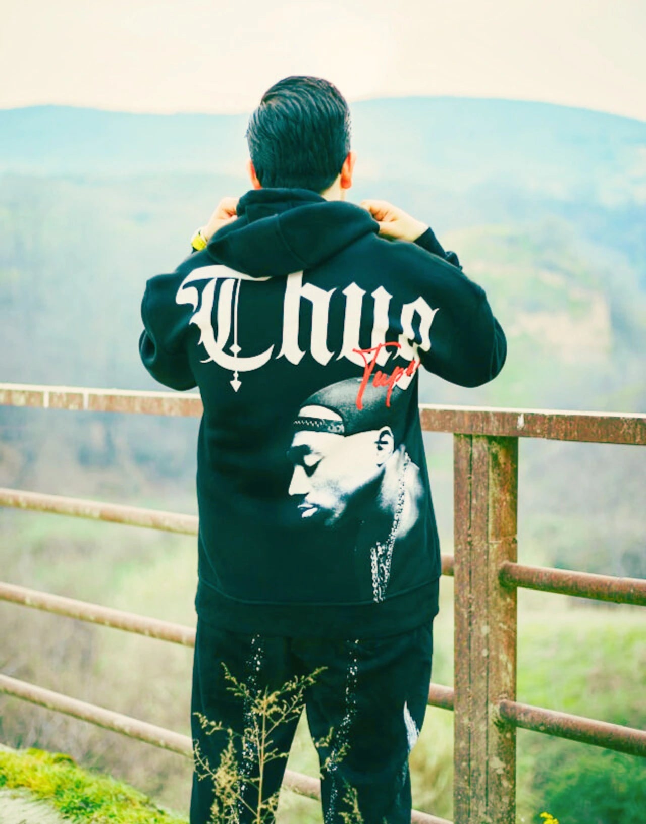 A male model wearing screen printing on hoodies – high quality, full-colour designs - TxTPrint Texas