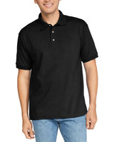 Person wearing a black polo shirt on a white background