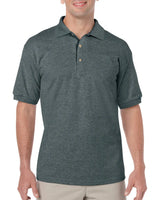 Man wearing a dark gray polo shirt on a white background